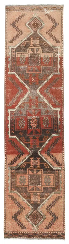 Full overhead view of the rust and beige tribal geometric vintage runner