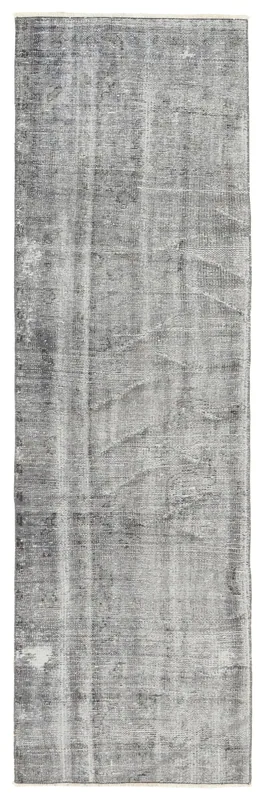 Full top view of the 2'4" x 7'8" charcoal gray distressed vintage Anatolian runner rug on a white background.