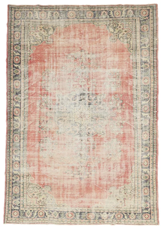 Full top view of the 7'8" x 10'11" vintage rose and navy Anatolian area rug on a white background.