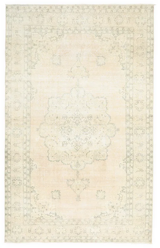 Full top view of the 6'10" x 10'9" beige and gray vintage Anatolian area rug on a white background.