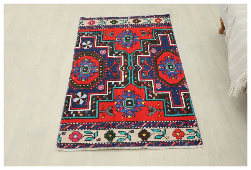 Full top view of the vintage 2x5 Anatolian rug with red, navy, and beige colors