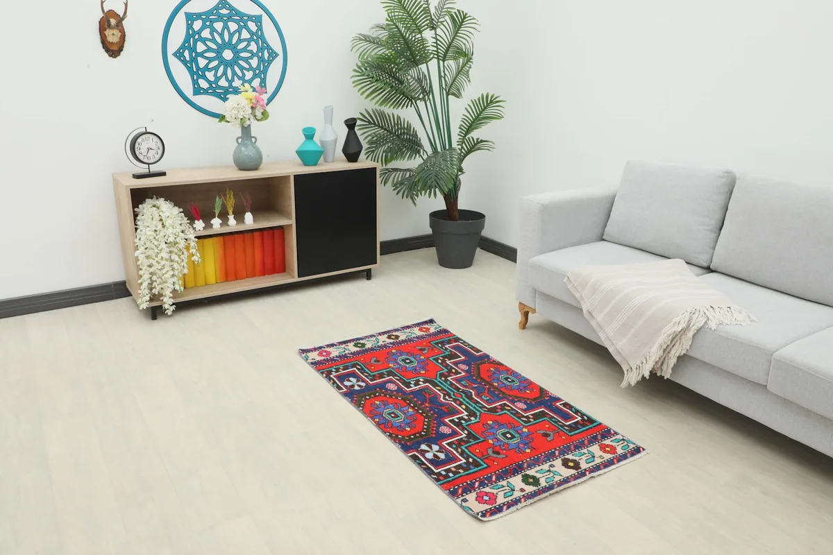 Anatolian rug in a living room setting, showcasing its size next to a sofa and cabinet