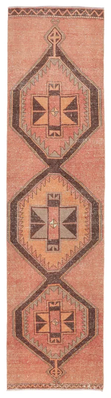 Full overhead view of the 2'11" x 11'7" rust geometric Anatolian runner rug on a white background.