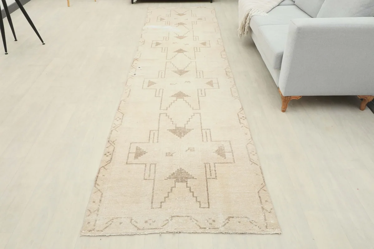 Full overhead view of the vintage Anatolian runner rug in a room setting
