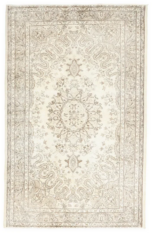 Full overhead view of the ivory and beige vintage Anatolian area rug.