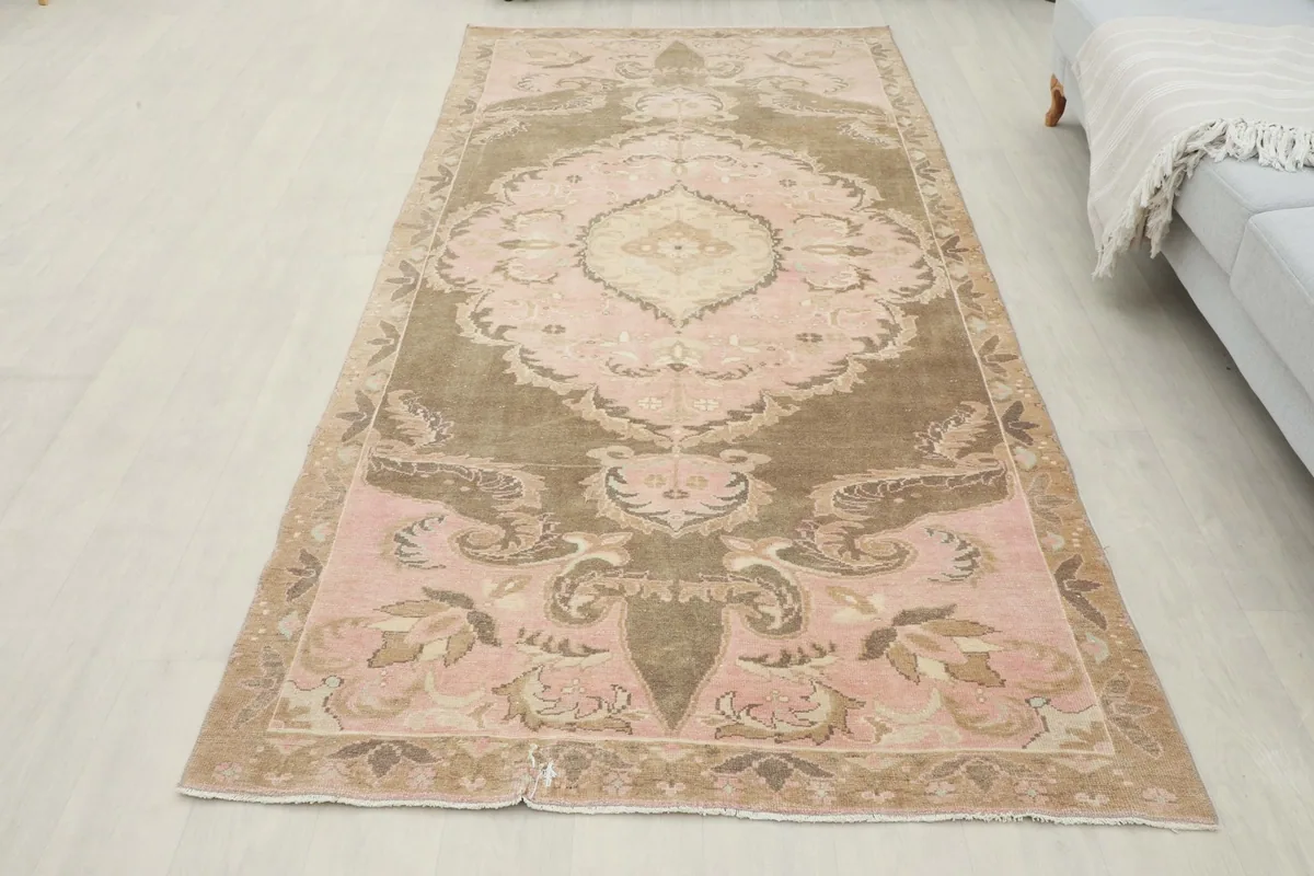 Full overhead view of the vintage Anatolian rug, providing a complete perspective of its design and colors