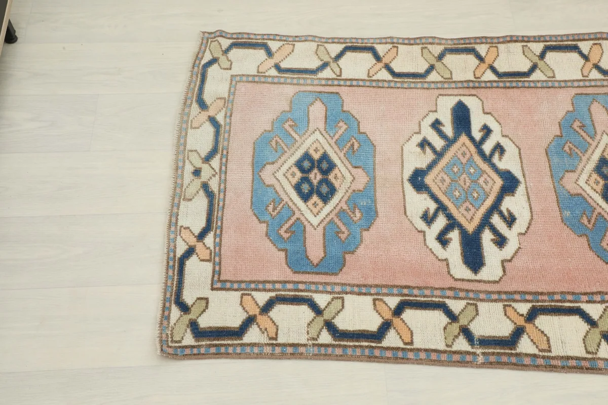 Close-up of the other end of the runner, showing the hand-knotted detail and colors.