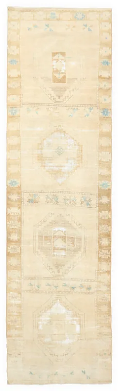 Full top view of the 3'5" x 12'6" beige Anatolian runner rug on a white background.