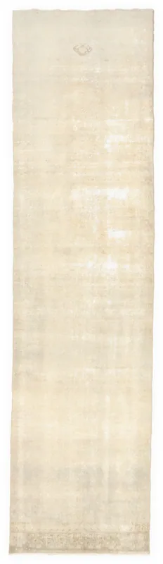 Full top view of the beige and ivory vintage Anatolian runner rug on a white background.