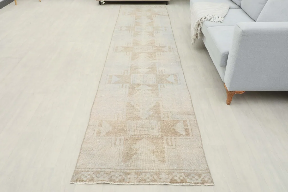 Full length view of the runner rug in a modern living space, showcasing its overall appearance