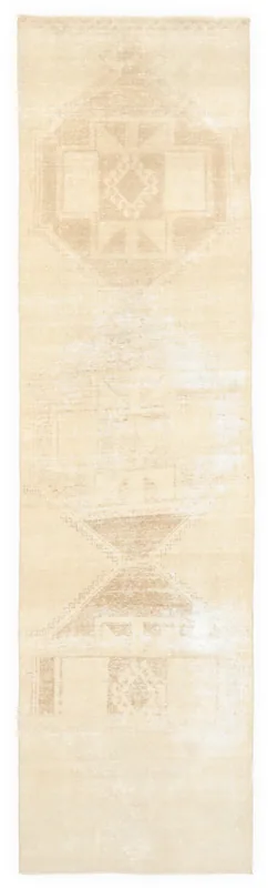 Full top view of the 3'1" x 11'3" vintage beige runner with subtle tan geometric patterns.