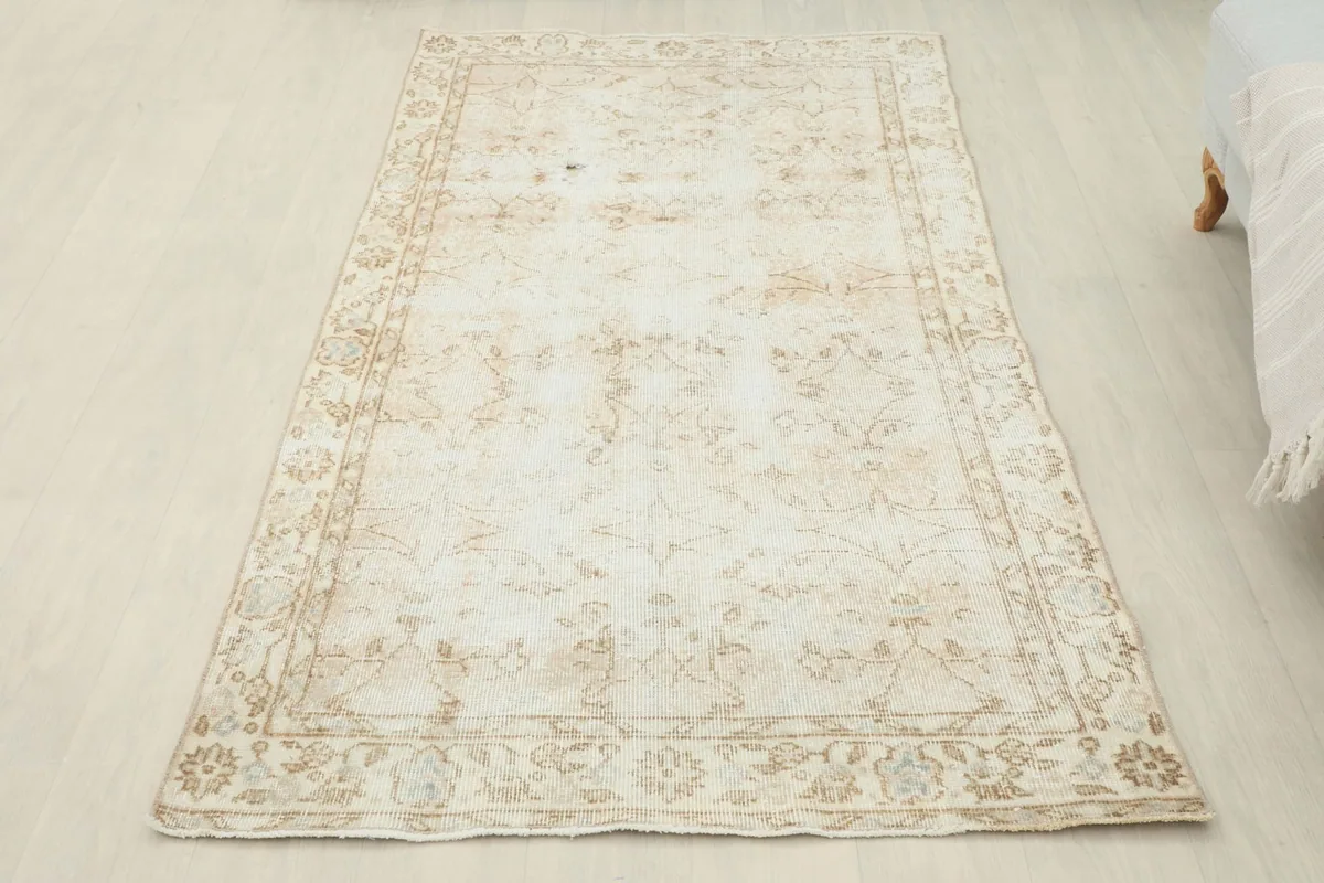 Full overhead view of the area rug placed on a light-colored floor.