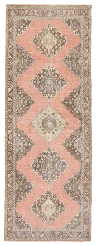 Full overhead view of the vintage rose Anatolian runner rug with medallion motifs