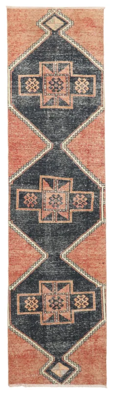 Full overhead view of the vintage Anatolian runner rug with rust and navy geometric pattern