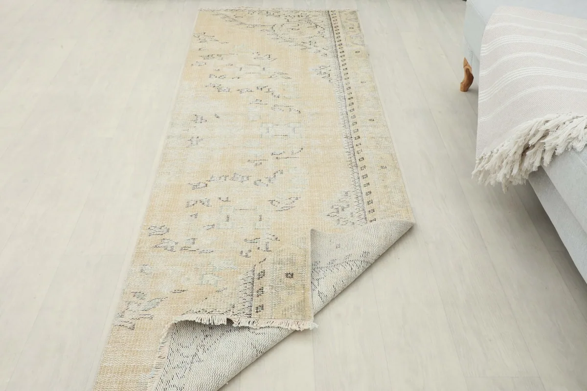 Runner partially folded to show the flexibility and thickness of the material