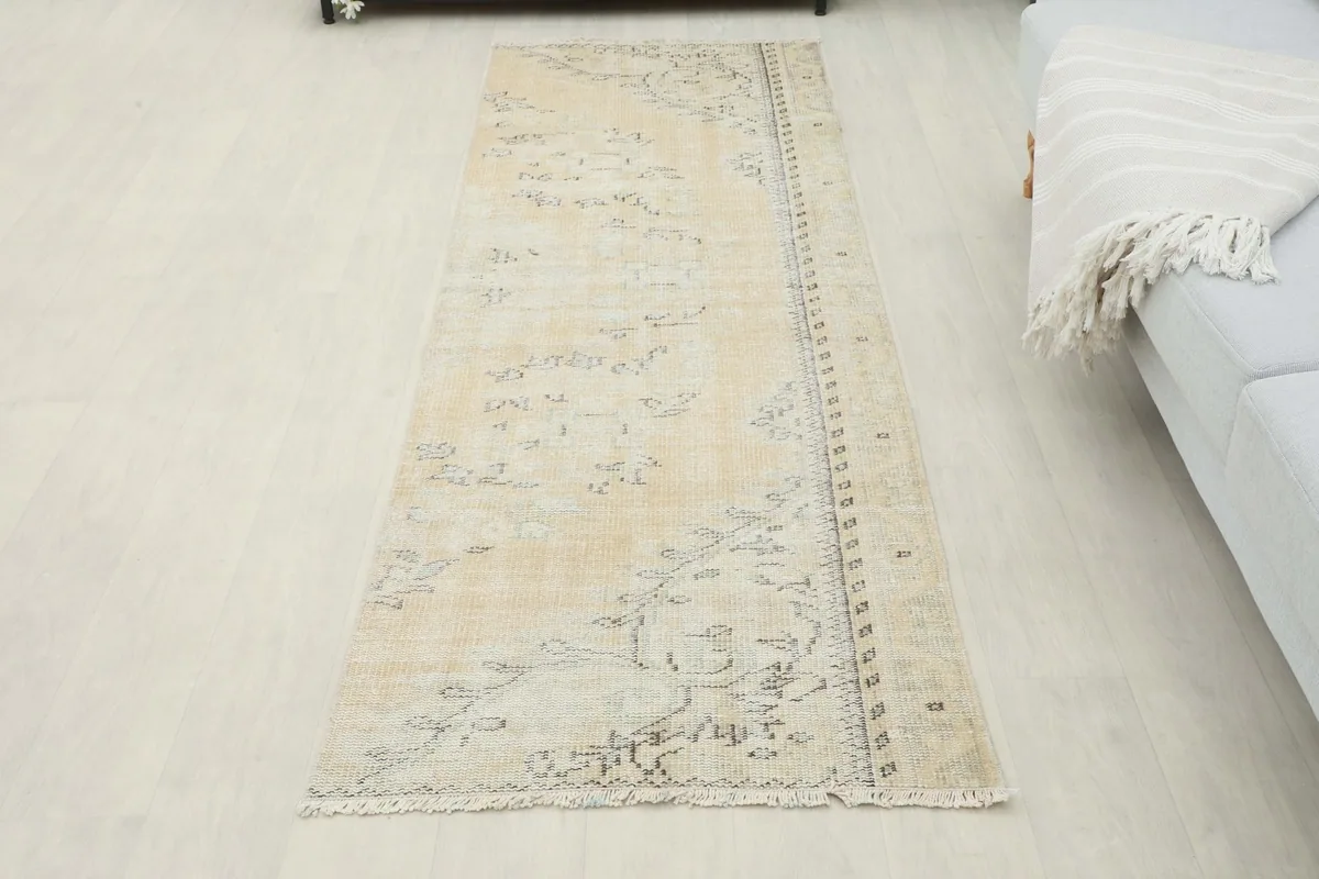 Full overhead view of the runner in a room, complementing the light-colored floor