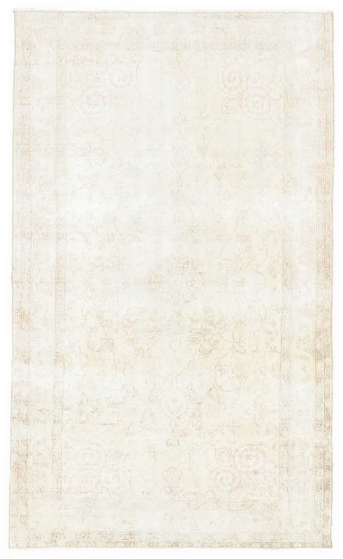 Full overhead view of the 5x8 ivory and rose vintage Anatolian rug on a white background