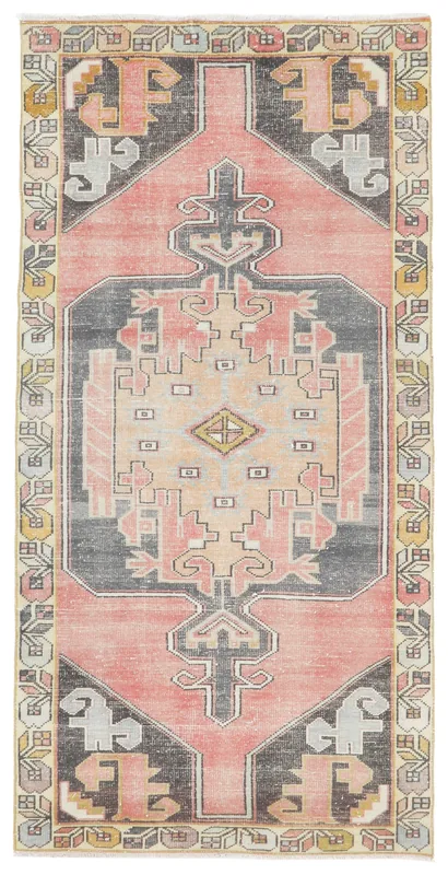 Top view of the 4x8 vintage Anatolian rug with rose field and charcoal border