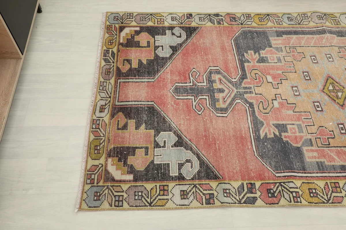 Close-up angled view of the rug's other corner, highlighting the intricate patterns