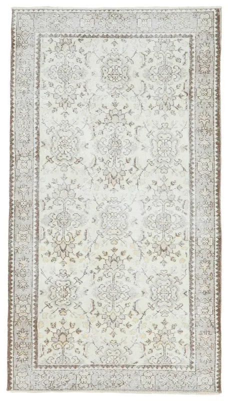 Full top view of the 4x6 ivory and beige floral vintage Anatolian rug