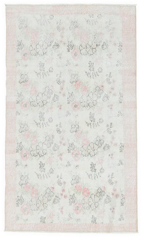 Full top view of the 4x6 rose and ivory floral vintage Anatolian rug on a white background
