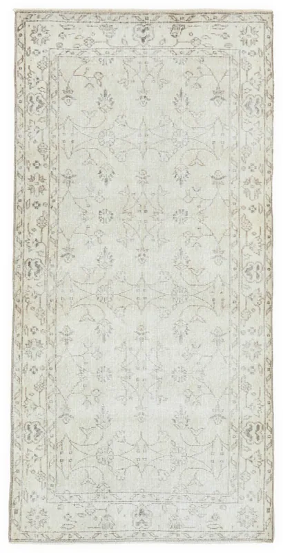 Full top view of the Beige Subtle Floral Rug, showcasing its overall pattern and muted colors.