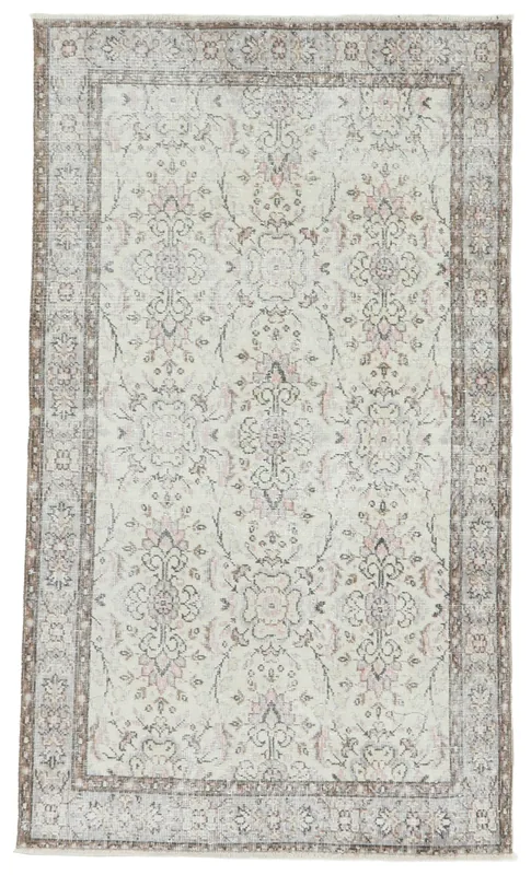 Full overhead view of the 4x6 cream and rose vintage Anatolian rug on a white background