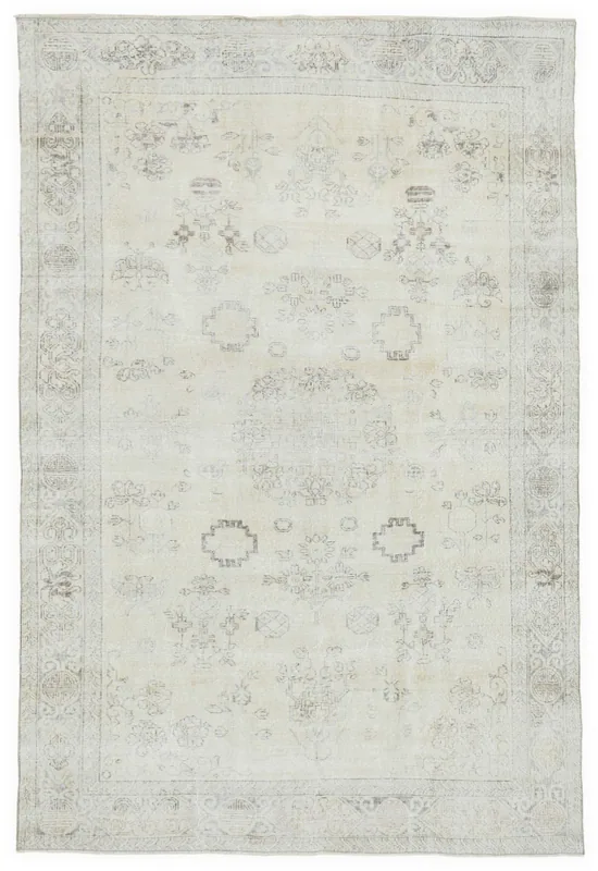 Full overhead view of the 6'7" x 9'10" ivory and beige vintage Anatolian rug on a white background.