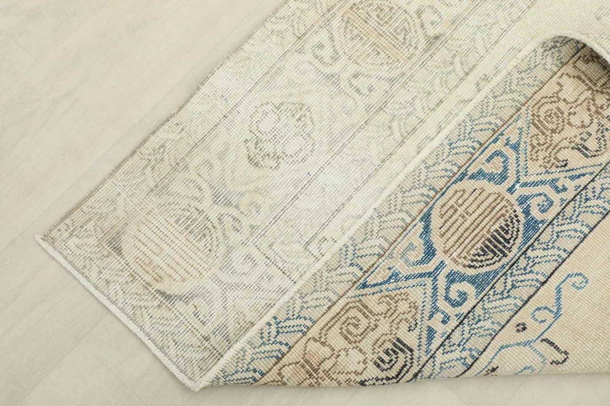 View of the reverse side of the rug, showing the knotting and foundation details.