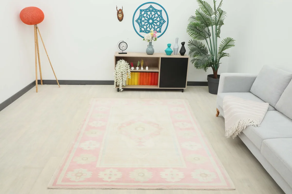 Overview of the rug in a living room, providing a sense of its scale and design in a home environment
