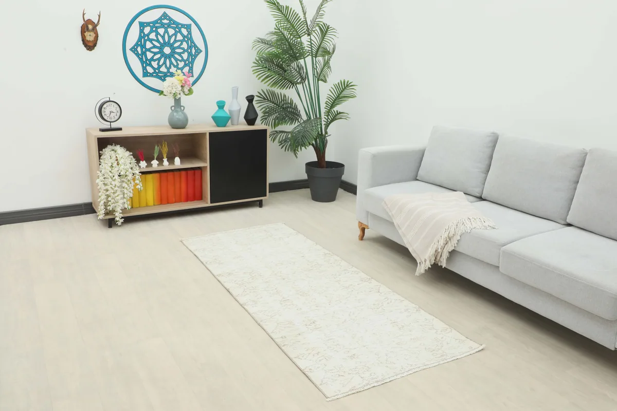 Ivory Floral Anatolian Runner in a modern living space, showing its size and neutral tones.