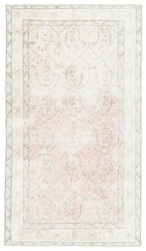 Full top view of the 4x7 vintage Anatolian rug with rose and ivory colors on a white background