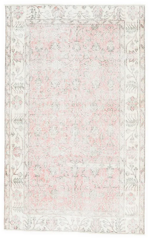 Full top view of the 4x6 pink and ivory vintage Anatolian area rug on a white background.