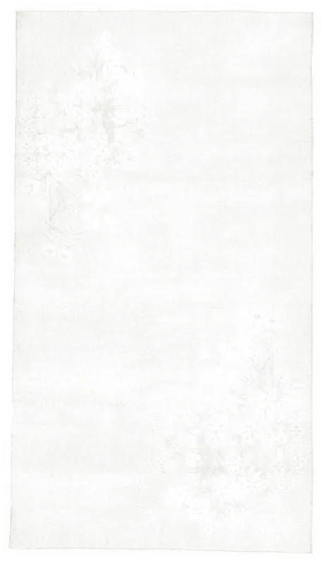 Full top view of the muted beige floral vintage Anatolian rug