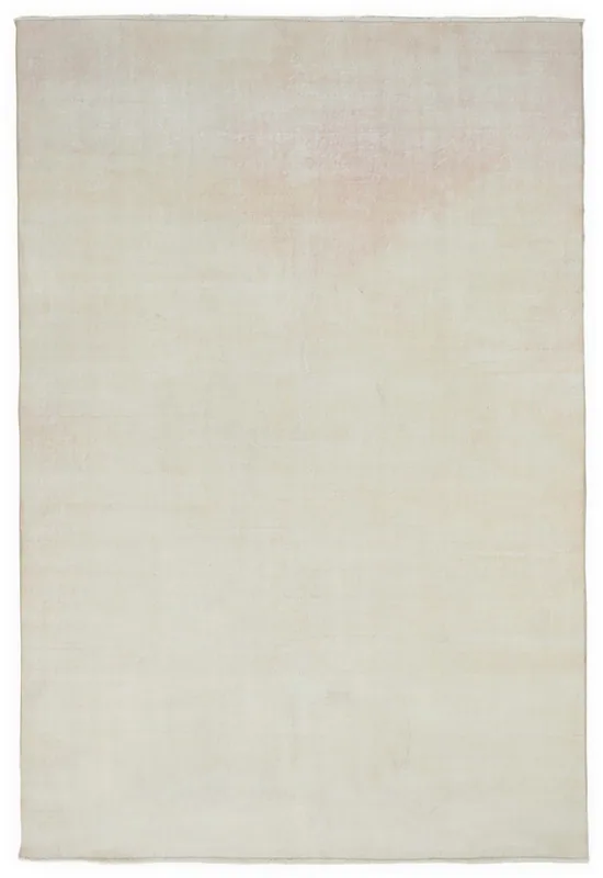 Full overhead view of the 6'6" x 9'7" cream and rose vintage Anatolian area rug on a white background