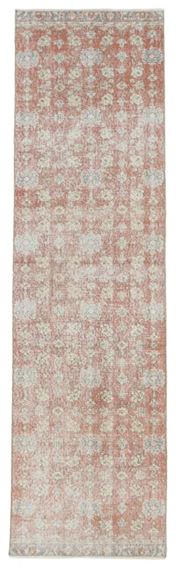 Full overhead view of the rust, beige, and gray floral vintage Anatolian runner