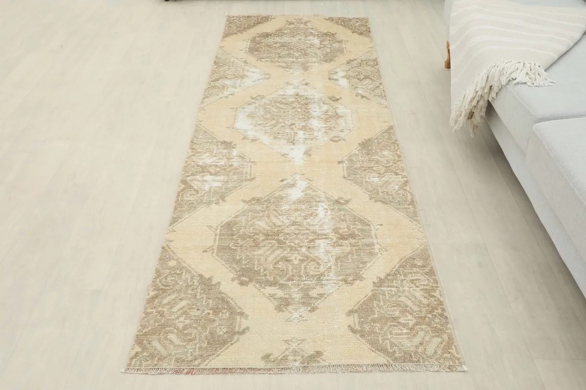 Overhead view of the runner rug in a room, showcasing its full design and proportion