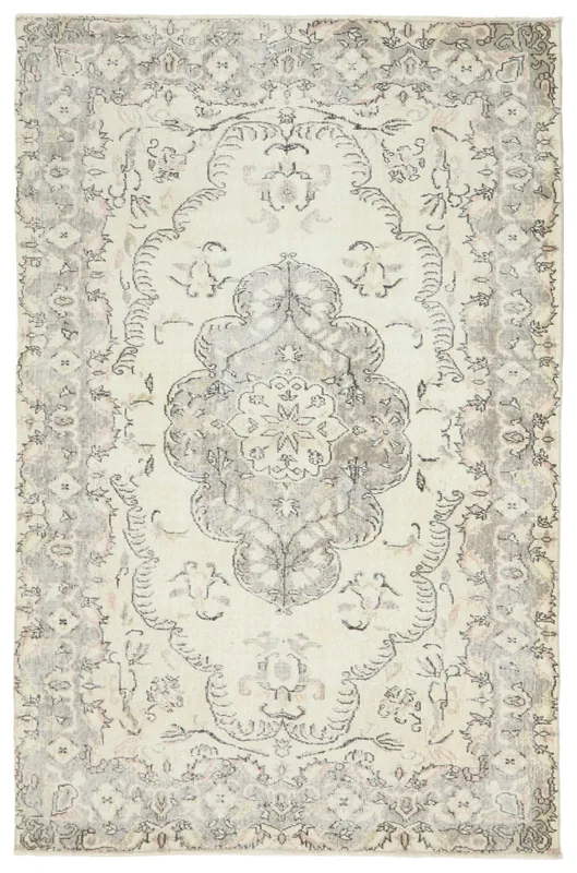 Full overhead view of the 5x8 ivory and gray vintage Anatolian area rug