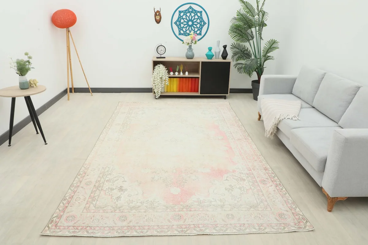 Full room view of the large vintage Anatolian rug, offering a sense of its presence in a living area.