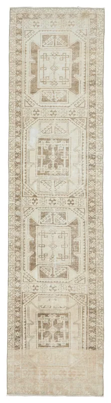 Full top view of the 2'9" x 11'4" vintage Anatolian runner rug on a white background.
