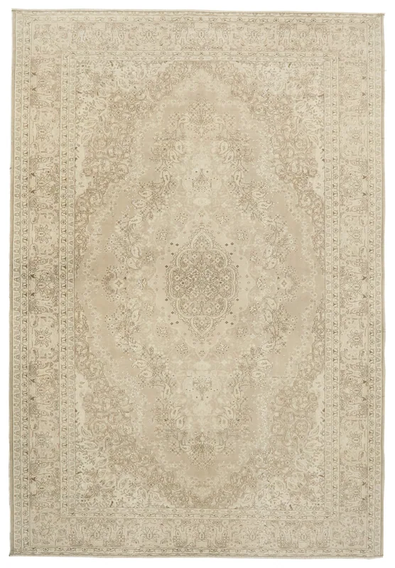 Full top view of the 6'10" x 9'10" ivory and beige vintage Anatolian area rug