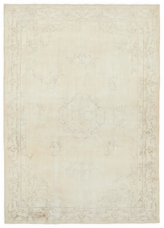 Full top view of the 7x10 ivory faded medallion vintage Anatolian area rug