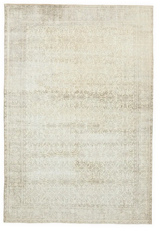 Full overhead view of the 6'10" x 9'11" ivory and tan vintage Anatolian rug