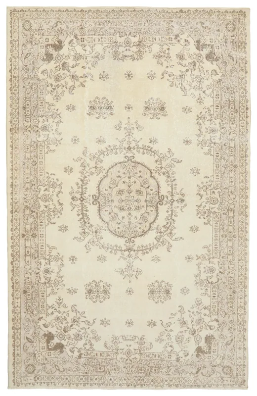 Full top view of the 6'5" x 10'0" vintage Anatolian rug with ivory field and beige medallion.
