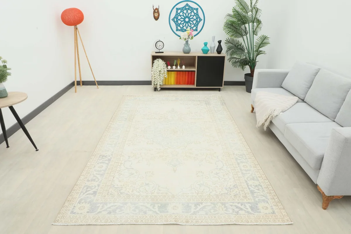 Full room view of the Ivory Gray Medallion Area Rug, providing a sense of scale and ambiance