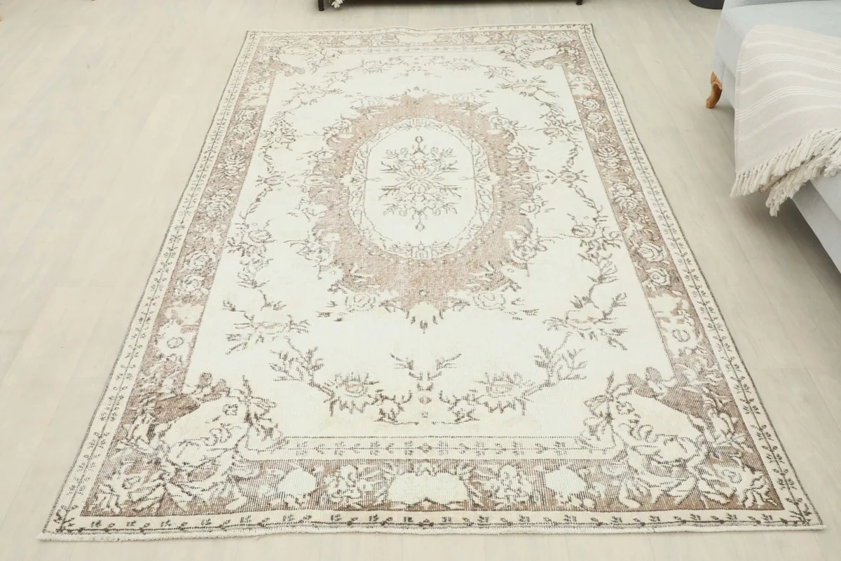 Full view of the rug in a room, positioned to show its entire design and scale.