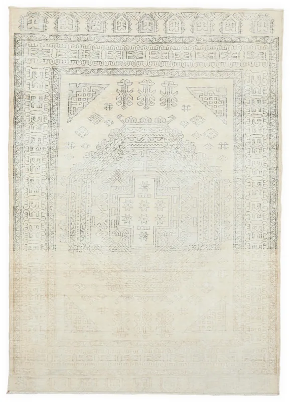 Full overhead view of the ivory and gray geometric vintage Anatolian rug