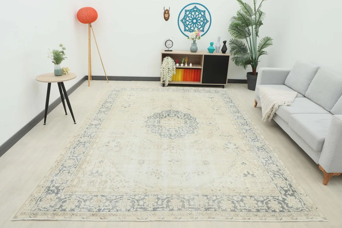Full room view of the beige and gray vintage Anatolian rug as a central design element