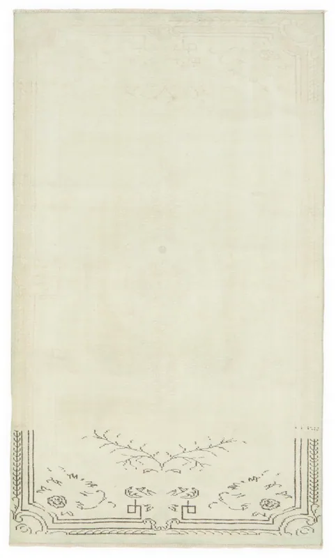 Full top view of the ivory hand-knotted vintage Anatolian area rug on a white background.