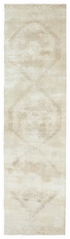 Full top view of the 2'11" x 11'0" beige geometric Anatolian runner rug on a white background.